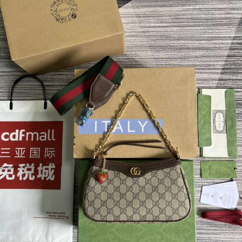 G*u*i top handle bags